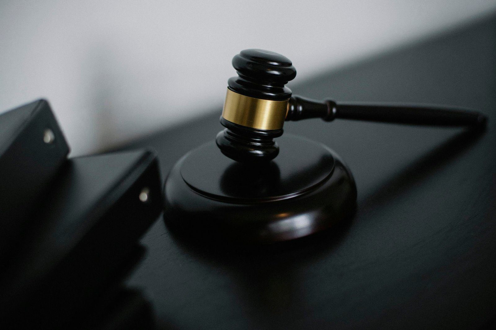 Nurture Discipline 1 Close-up of a wooden gavel on a desk, symbolizing justice and legal authority.